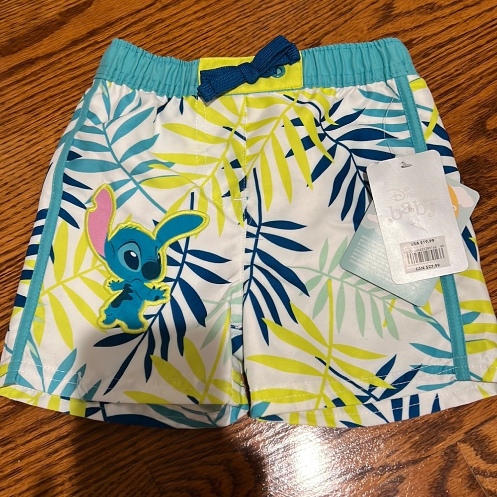 NWT Disney baby swim trunks UPF 50+ 9-12mo